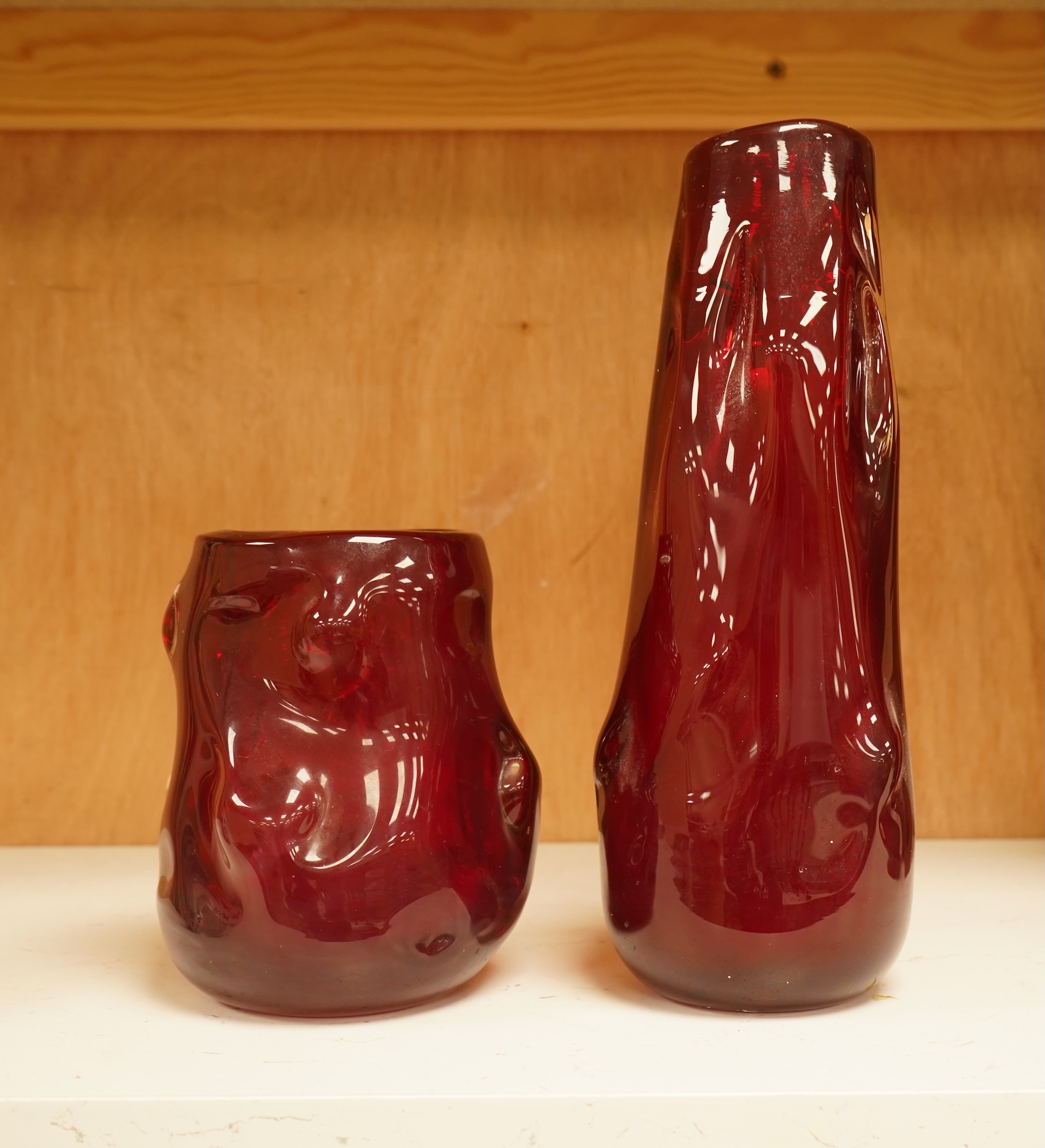 Two Whitefriars ruby red ‘knobbly’ glass vases, tallest 25cm